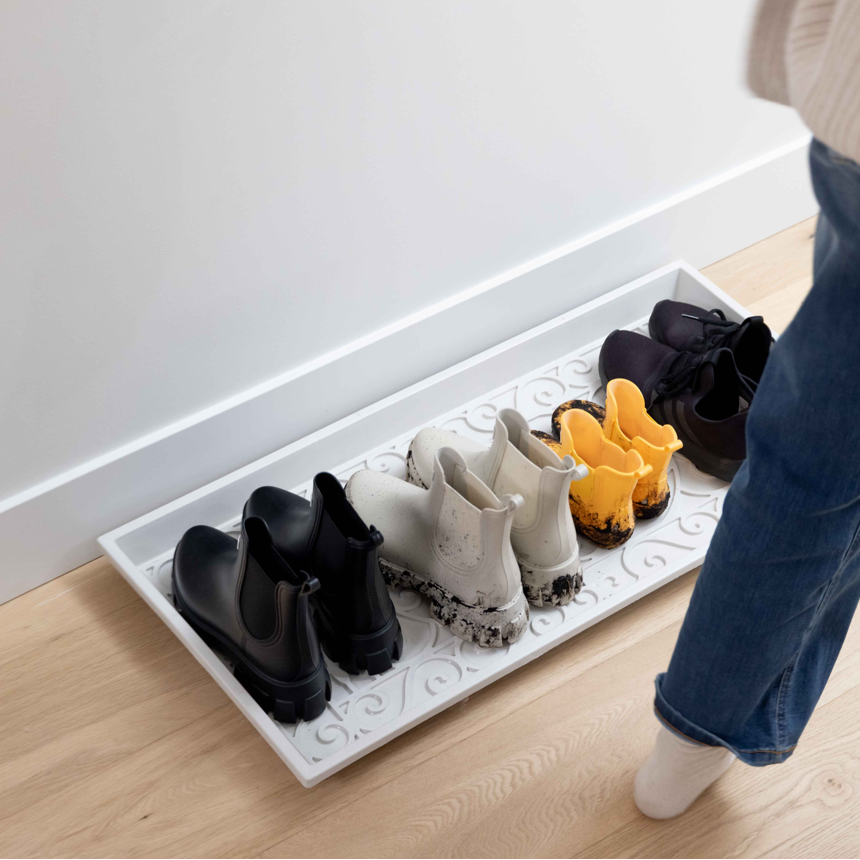 Muddy shoes on a sturdy boot try